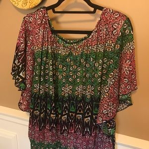 Flower print top with elastic at waist.